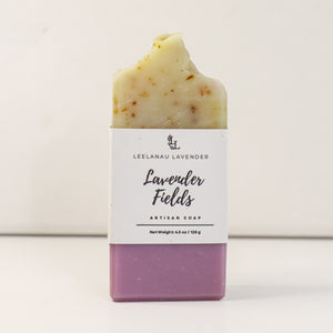 Bar of soap with a white label on a light background